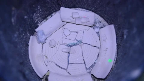 Broken plate made out of raw clay in the bucket Видео 148265152
