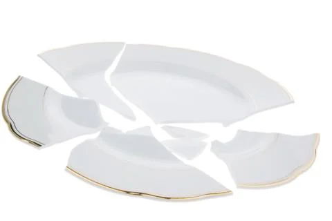 Broken plates Stock Photos