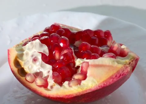 Broken pomegranate\ Stock Photos