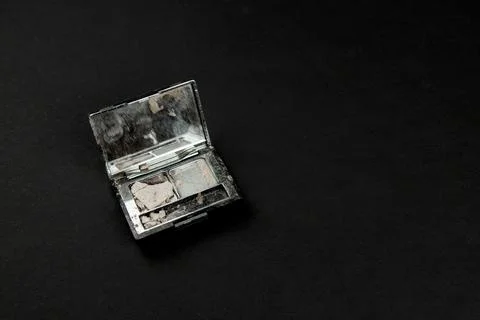 Broken powder in an open package Stock Photos