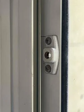Broken push window handle missing, only mounting hardware remains Foto stock