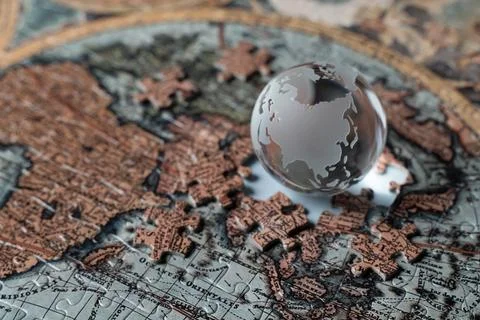 Broken puzzles and globe objects around China Stock Photos