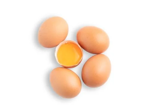 Broken raw egg isolated on the white background Stock Photos