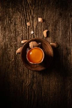 Broken raw farm egg Stock Photos