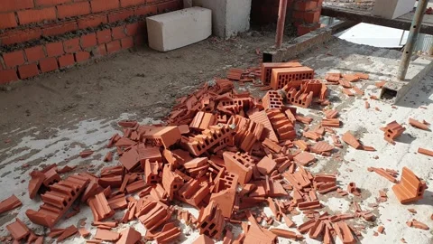 Broken red brick. Construction waste. Construction garbage. Stock Footage 153054441