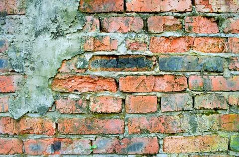 Broken red brick. Stock Photos