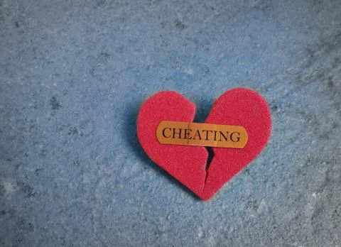 Broken red cheating heart Stock Photos