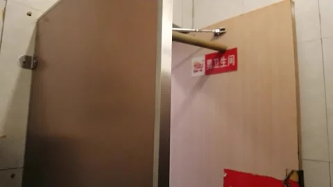Broken Restroom Door with Push Hard Sign in Chinese Stock Footage 333549946
