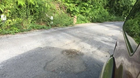 Broken road bad asphalt Stock Footage 67586899