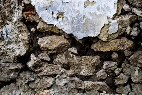 Broken Rock Texture Background. the texture of the old and broken wall Stock Photos