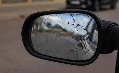 Broken side mirror of a car Stock Photos