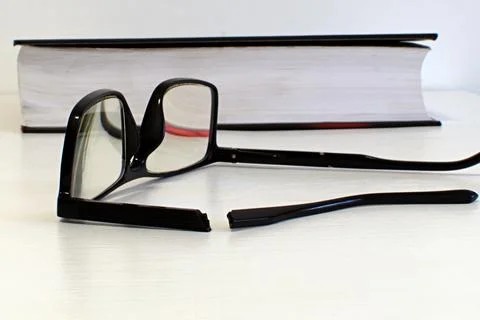 Broken side piece of glasses Stock Photos