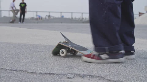 Broken Skateboard Deck Lying on Concrete at Skatepark Stock Footage 323428692