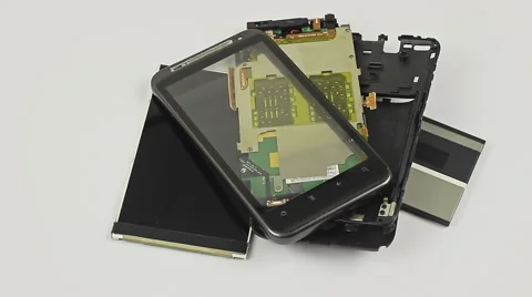Broken smart phone with sim card close up rotation on white background. Stock Footage 55009898