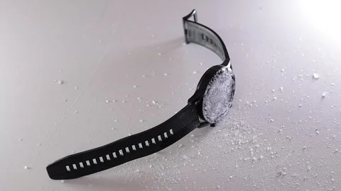 Broken smart watch. Shattered glass on modern smartwatch. Destroyed main dial on Stock Footage 286422100