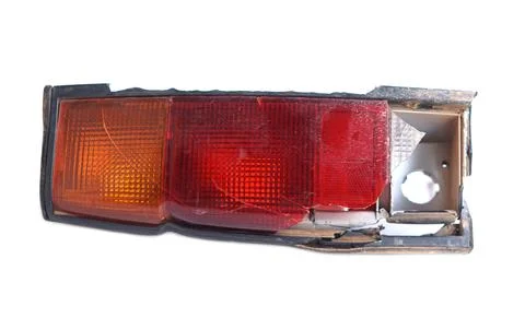 Broken spare part of car tail light, isolated on white background. Concept,damag Stock Photos