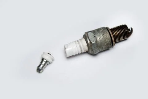Broken spark plug on white background Stock Photos