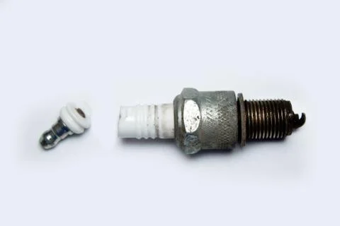 Broken spark plug on white background Stock Photos