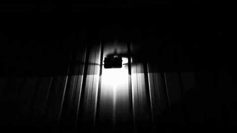 A broken spotlight flashing on the wall of an abandoned warehouse Stock Footage 200919106