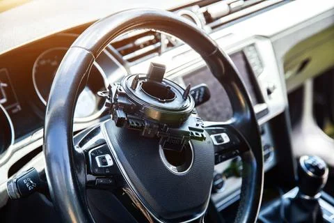 Broken steering column electrical cable of a car against the background of the Photos