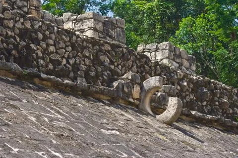 Broken stone loop used in mayan ball game Stock Photos