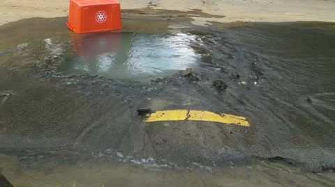 Broken street water main wasted water 2 Stock Footage 8908856