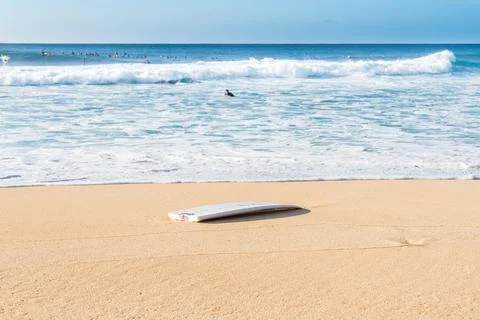 A broken surfboard at the beach Stock Photos