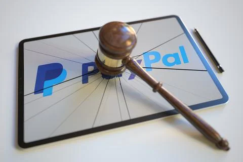 Broken tablet computer screen with logo of PAYPAL and judge's gavel. Editorial Stock Illustration