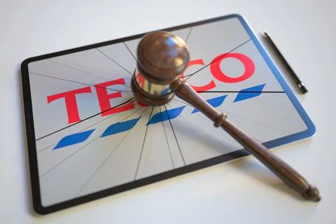 Broken tablet computer screen with logo of TESCO and judge's gavel. Editorial イラスト素材