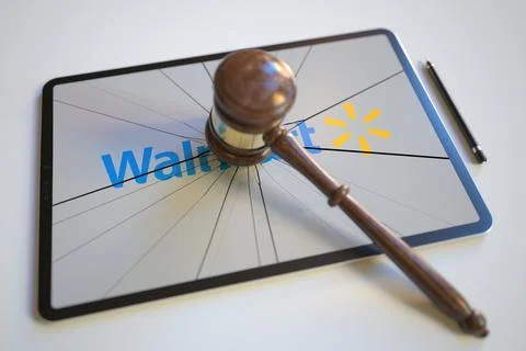 Broken tablet computer screen with logo of WALMART and judge's gavel. Editorial Illustrazione stock