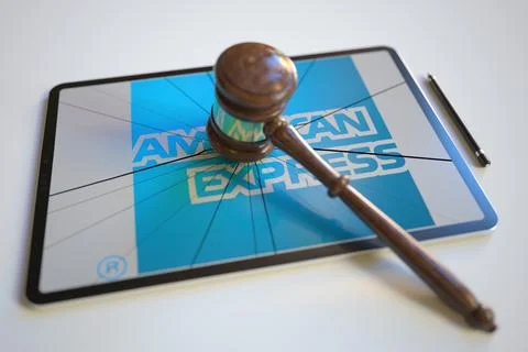 Broken tablet computer screen with logo of AMERICAN EXPRESS and judge's gavel Stock-Illustration