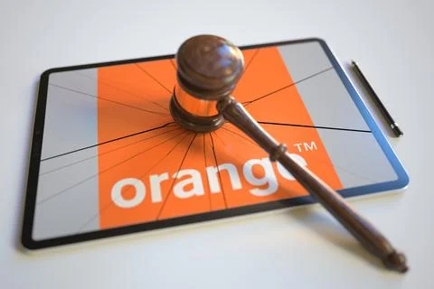Broken tablet computer screen with logo of ORANGE S.A. And judge's gavel Stock Illustration