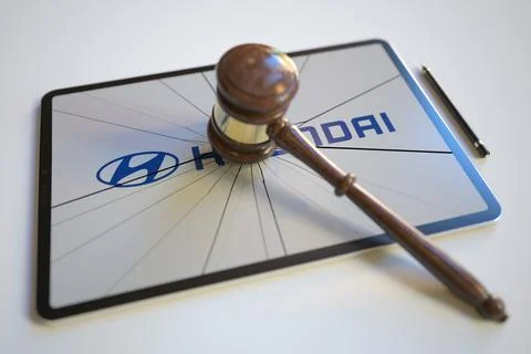 Broken tablet computer screen with logo of HYUNDAI and judge's gavel. Editorial Stock Illustration