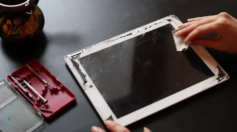 Broken tablet on the  service table Stock Footage 61321641