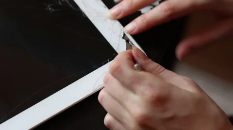 Broken tablet on the  service table Stock Footage 61321899