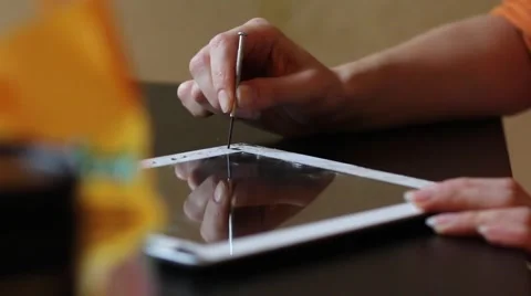 Broken tablet on the  service table Stock Footage 61322680