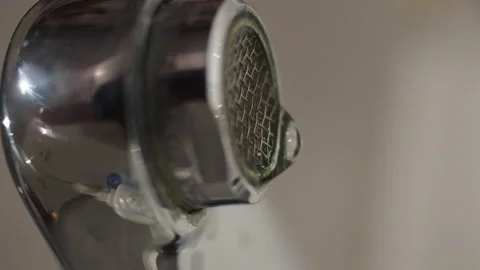 A broken tap in the sink leaking water. Stock Footage 143221573