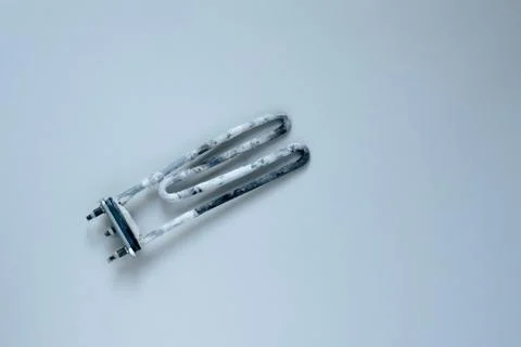 Broken ten. heating element of the washing machine Stock Photos