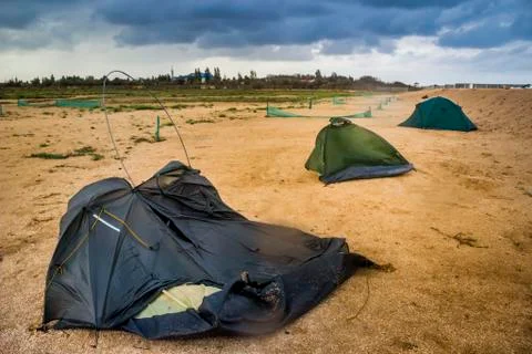 Broken tent at the beach Stock Photos