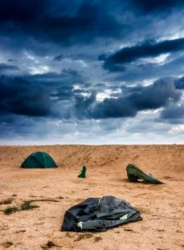 Broken tent at the beach Stock Photos