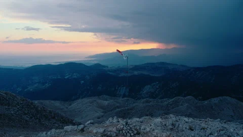Broken torn wind sock on mountain top at sunset Stock-Footage 261997345