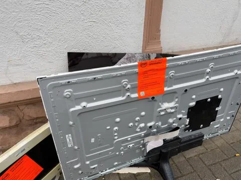 Broken TV On Sidewalk Stock Photos