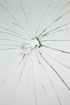 Broken vertical  glass white background Stock Photos
