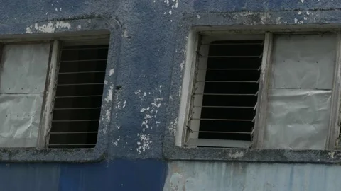 Broken vintage windows of abandoned building near Sudi Mampir market Stock Footage 156997155
