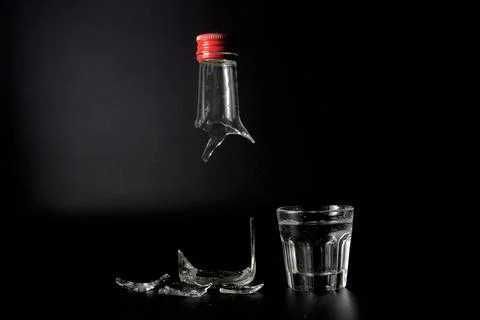 Broken vodka bottle Foto stock