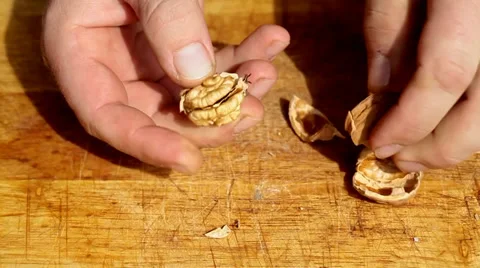 Broken walnut with hammer Stock Footage 35713014