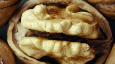 Broken walnut rotating, 4k Close up shot Stock Footage 155281402