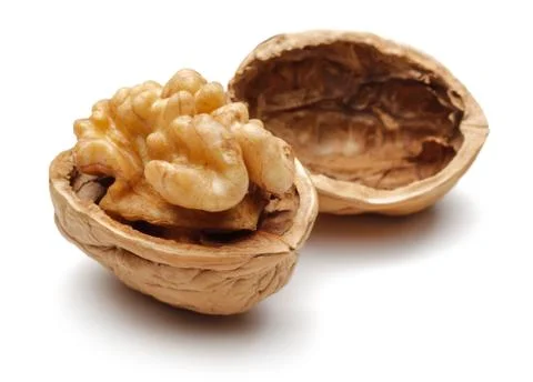 Broken walnuts isolated on white Stock Photos