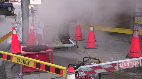 Broken water main flooding steam sinkhole in severe cold weather in Toronto 2015 Stock Footage 47010530
