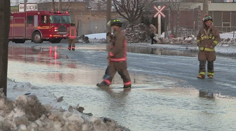 Broken water main flooding steam sinkhole in severe cold weather in Toronto 2015 Stock Footage 47025699
